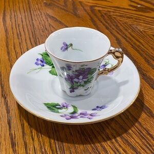 Antique floral teacup with plate